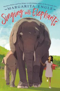 Cover of Singing with Elephants with the title and author's name "Margarita Engle," written over an image of a large elephant, baby elephant, and young girl walking together on grass