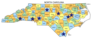 Map of North Carolina with stars over the following counties: Henderson, Gaston, Guilford, Cabarrus, Wake, Brunswick, Pitt, and Greene.
